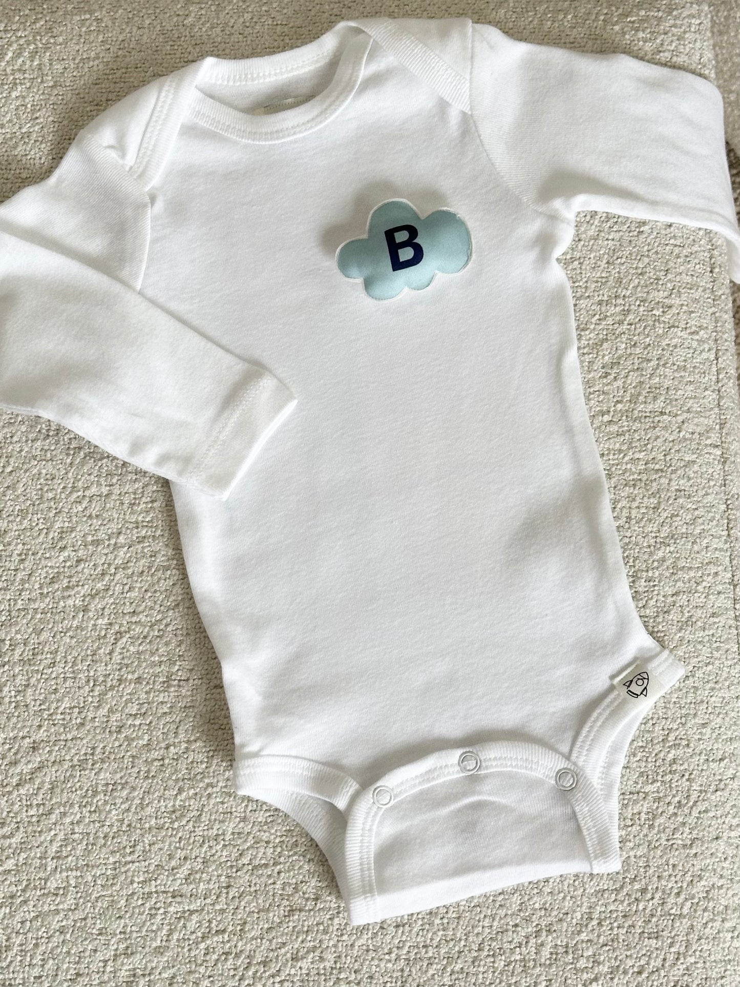 White bodysuit and 2 changeable decorations