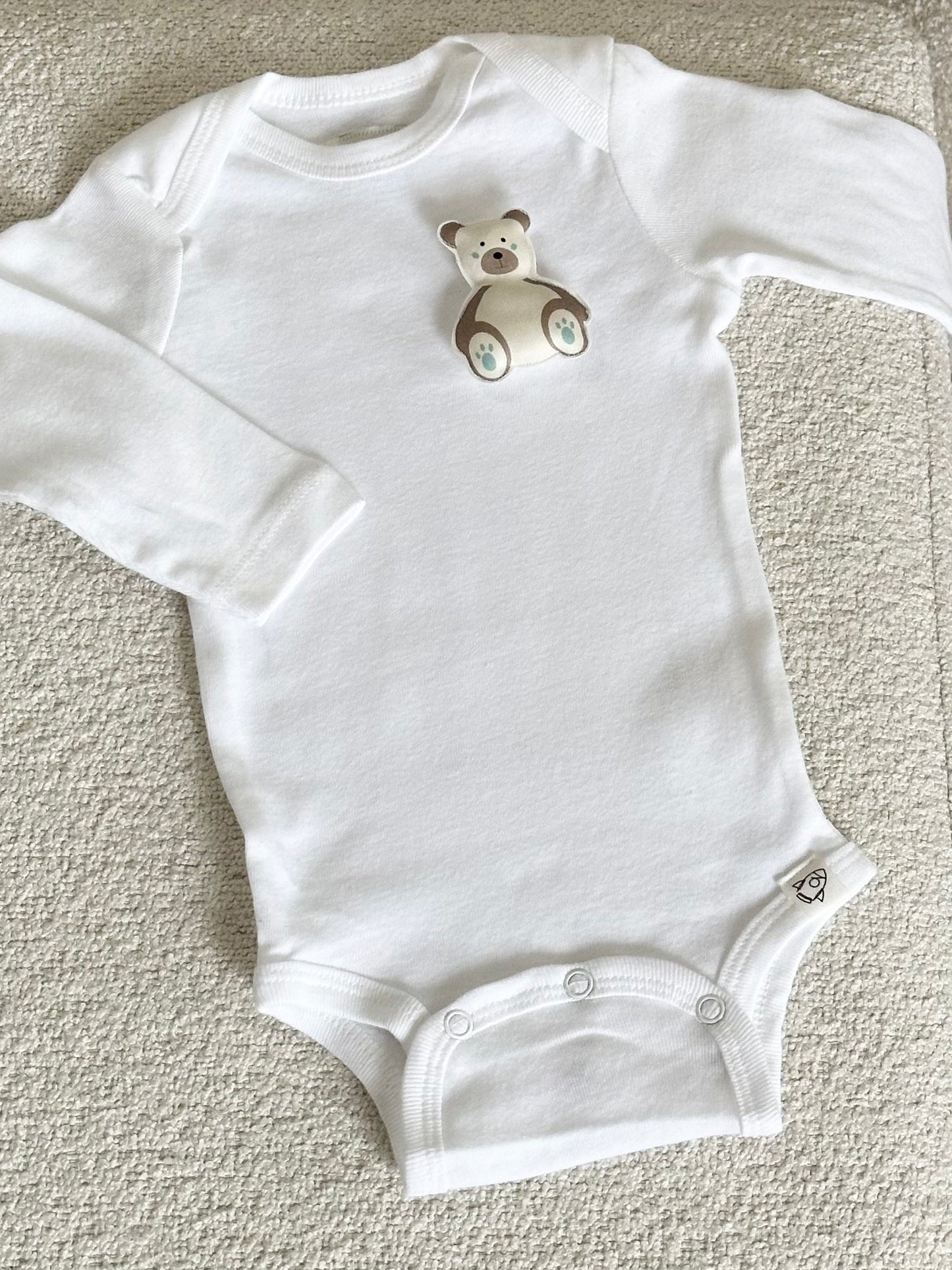 White bodysuit and 2 changeable decorations
